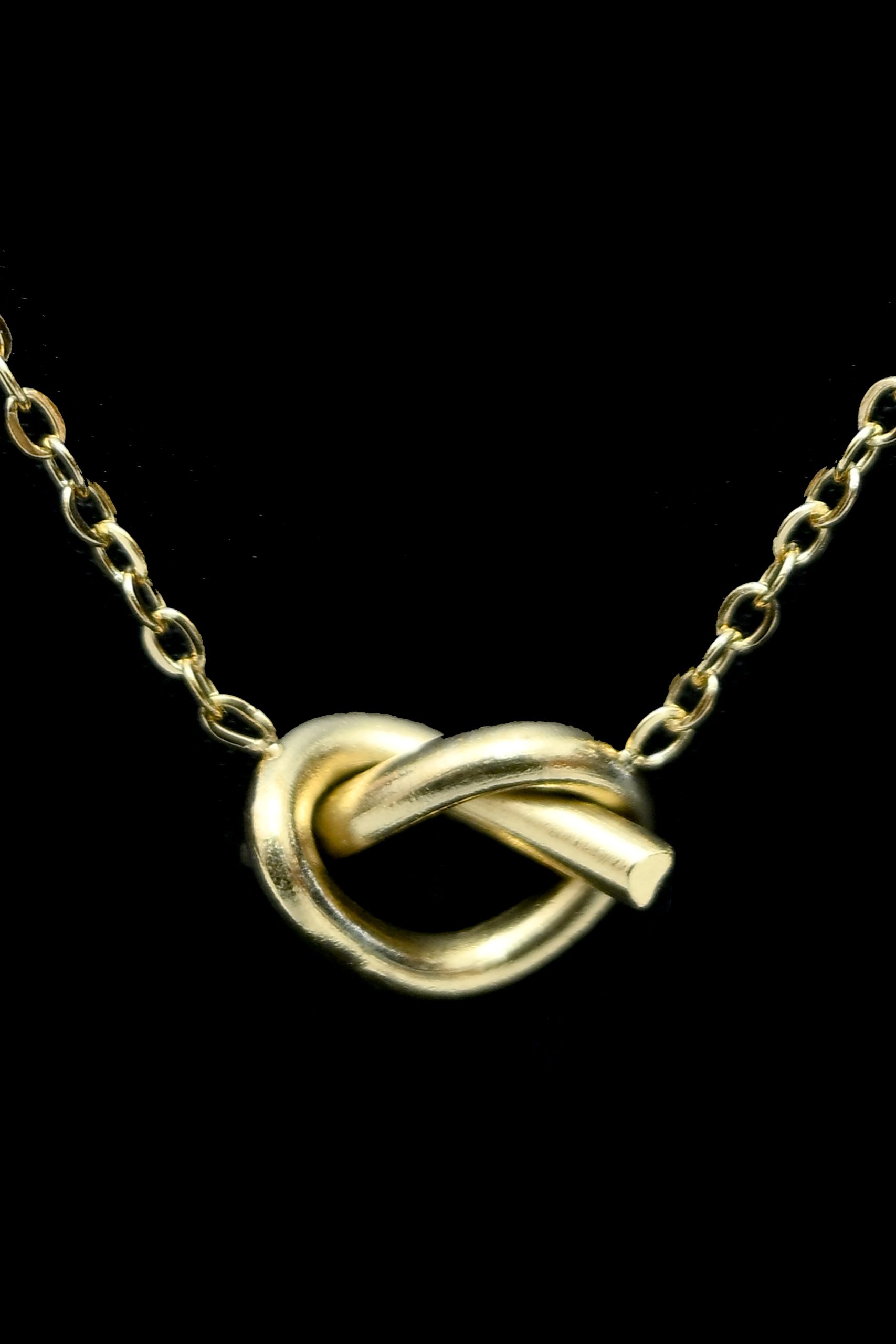 gold-tone-knot-pendant-necklace