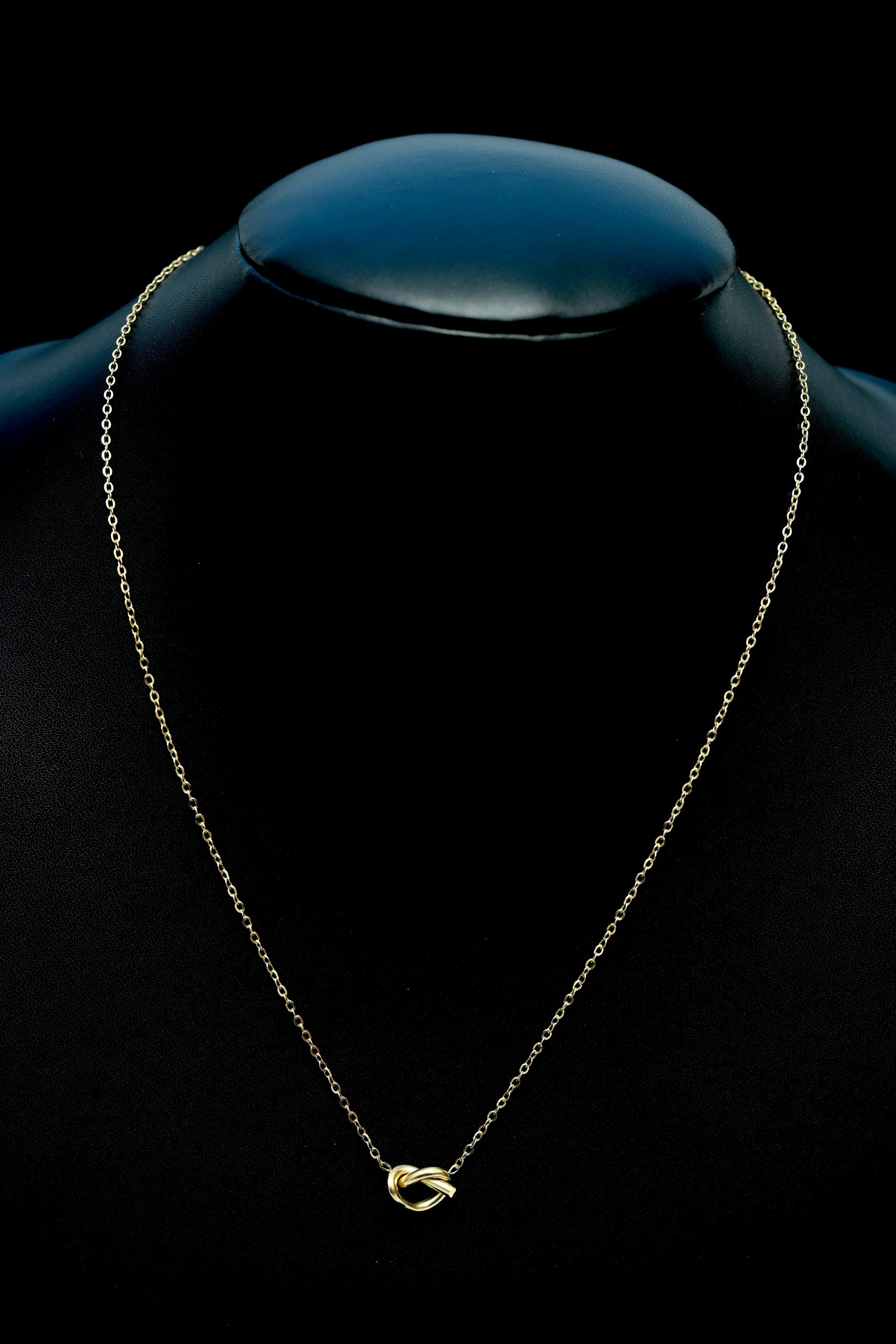 gold-tone-knot-pendant-necklace