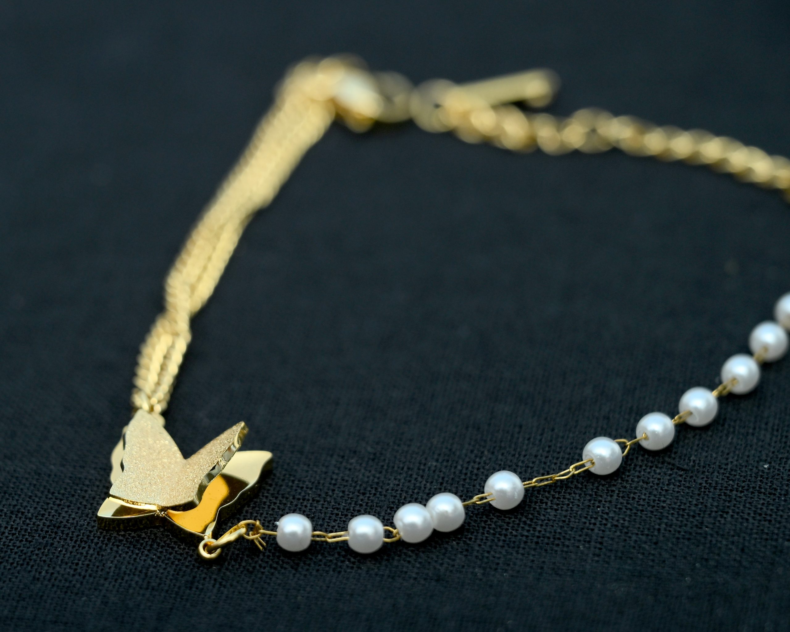 golden-butterfly-pearl-braclet